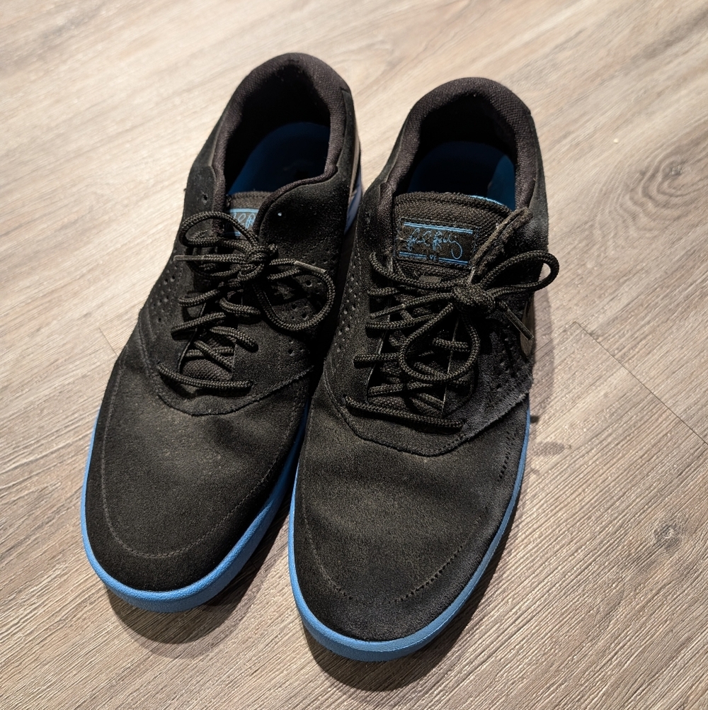 Nike Black Sneakers with Blue Accents